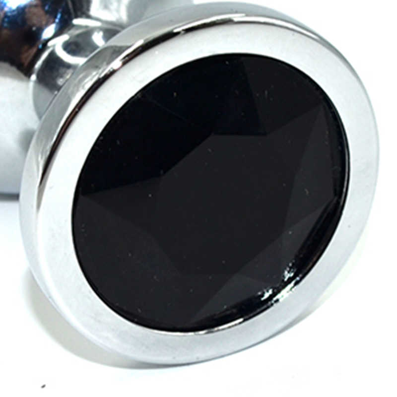 	Средняя анальная пробка KANIKULE, с черным кристаллом, серебристая, 8х3,5 см