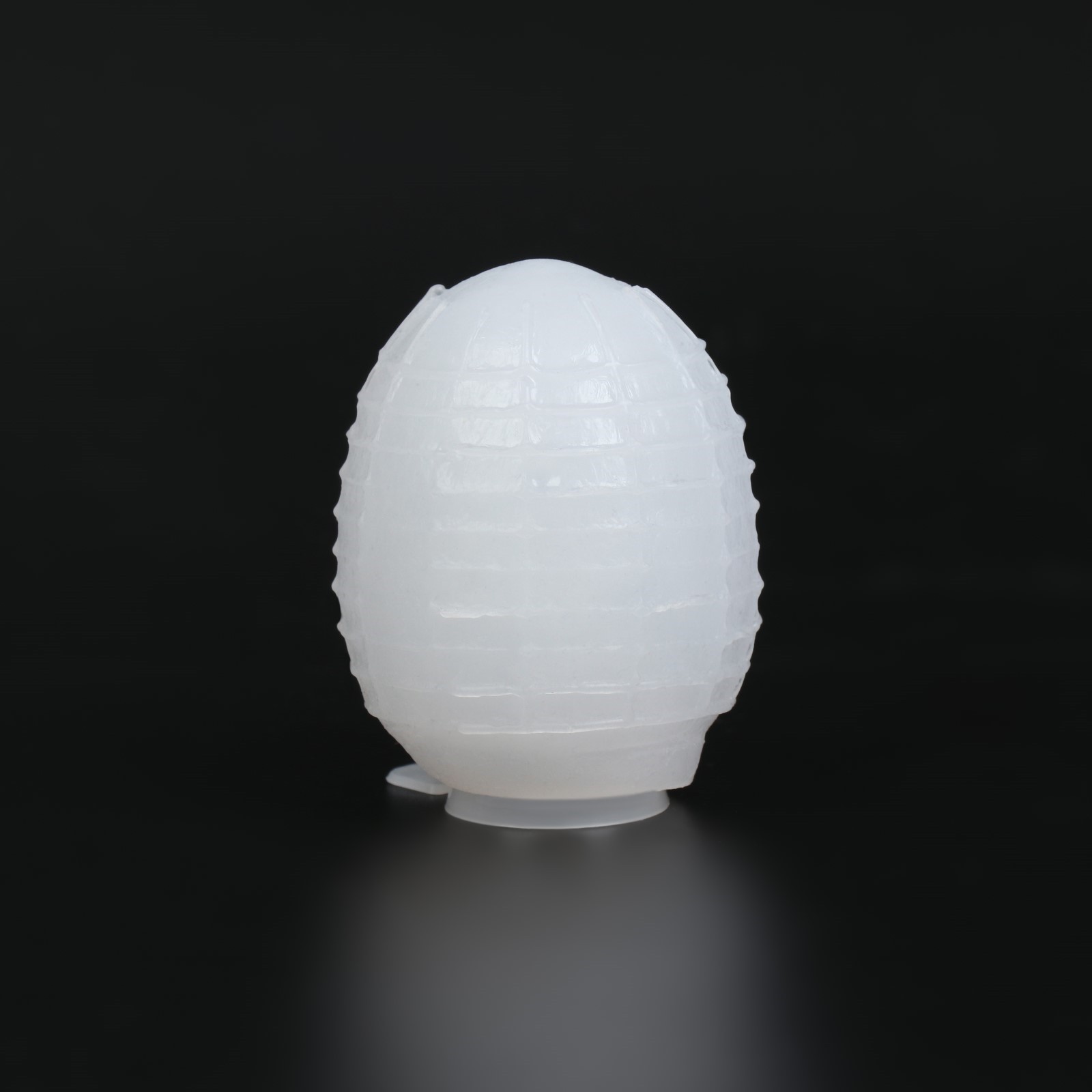 Акция 50% Мастурбатор-яйцо EGG рельефный, в футляре, бордовый, 6,6 х 6 см (небольшой дефект поверхности корпуса)